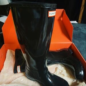 Hunter brand black rain boots, size 6.
